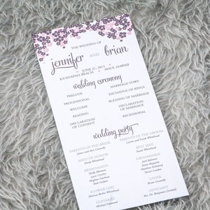 May include: A wedding program with a floral border. The program details the wedding ceremony, including the prelude, vows, and recessional. The names Jennifer and Brian are displayed at the top.