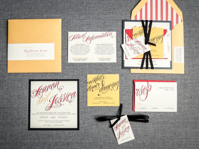 May include: Wedding invitation suite with a yellow, red, and black color scheme. The invitation features the names "Aaron and Jessica" in elegant calligraphy. The RSVP card is red with black calligraphy. The travel information card is yellow with black calligraphy.