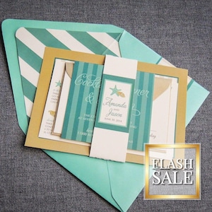 May include: A teal and gold wedding invitation with a striped pattern and the text "Cocktail & Dinner" and "Amanda and Jason June 28, 2014".