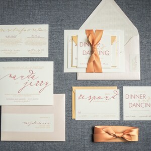 May include: Wedding invitation suite with a peach and gold color scheme. The invitation features the names "Amanda and Jerry" in a cursive script. The RSVP card has the word "respond" in cursive script. The reception card has the text "Dinner and Dancing" in a bold font.