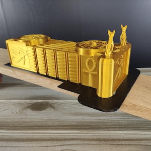 Ancient Alien Sarcophagus Replica – 3D Printed Gold & Black Display Piece
