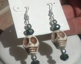 Handmade wire dangle white skull with green and silver beads earring