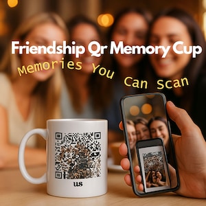May include: White ceramic mug with a QR code design and the word "us" at the bottom. The image shows a phone scanning the QR code on the mug. Text on the image reads "Friendship Qr Memory Cup Memories You Can scan."