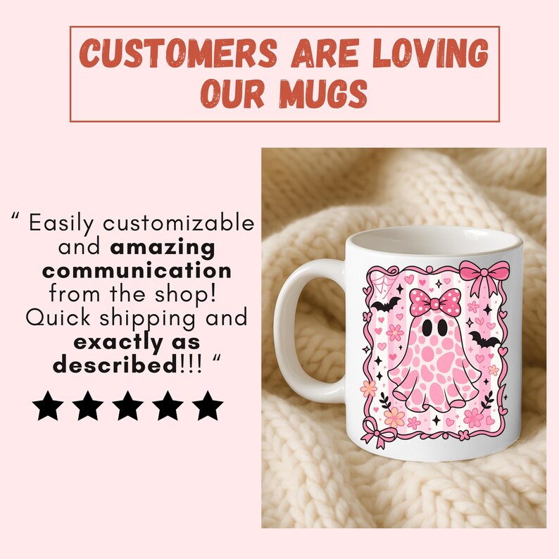 ceramic coffee mug featuring a pink spotted ghost with a bow, surrounded by bats, hearts, and flowers in a coquette aesthetic design