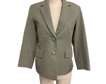 Vintage olijfgroen blazerjasje met knoopsluiting en nepzakken Fundraiser ondersteunt duurzame mode-educatie voor jongeren