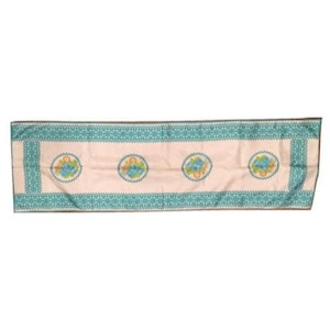 May include: A rectangular, off-white table runner with a teal border featuring a repeating geometric pattern. The center has four oval medallions with floral designs in blue, yellow, and orange.