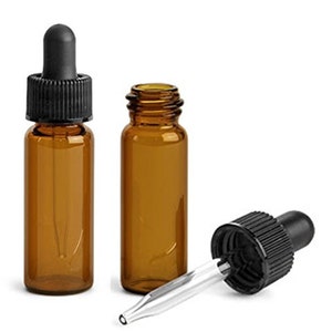 May include: Two amber glass bottles with black dropper caps and a separate clear glass dropper. The bottles are 1/2 ounce in size.