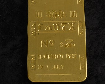 Clip para billetes RAW 100 Race Track 100 "FnV7X" N.° 7 Séptimo (7) de julio. Requiere acabado y doblado. NOS