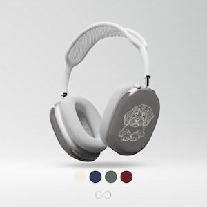 May include: Gray over-ear headphones with a white headband and ear cushions. The right ear cup features a white illustration of a dog. The headphones have a silver trim and are set against a white background. A color palette of cream, navy, green, and burgundy is shown below.