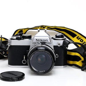 Nikon FE Film Camera with Nikkor 50mm f/2.0 Lens – Fully Functional, Clean Classic