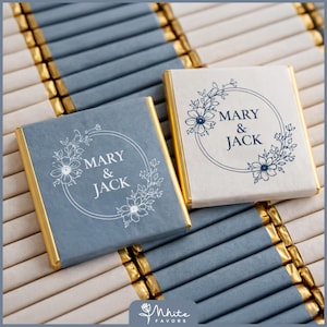 May include: A set of three ceramic mugs with a speckled, matte finish. The mugs are in shades of cream, light gray, and dark gray. Each mug has a simple, minimalist design, perfect for coffee or tea.