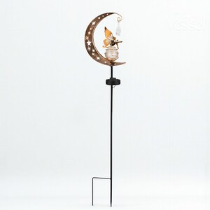 Solar moon fairy garden light with crackle glass globe and warm LED glow, eco-friendly outdoor stake lamp powered by solar panel, durable iron frame with waterproof IP65 design, 800mAh rechargeable battery for 10–12 hours of light, height 84 cm and width 16 cm, perfect for garden pathways, patios, balconies, or yard decoration, whimsical moon fairy design adds charm to outdoor spaces, energy-saving solar garden decor, great gift for garden lovers, birthdays, or housewarmings.