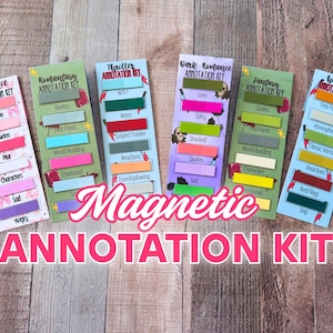 May include: A collection of colorful magnetic annotation kits for various book genres, including romance, thriller, and fantasy. Each kit features a different color scheme and includes labels for key elements like quotes, plot points, and characters. The text "Magnetic Annotation Kit" is displayed prominently.