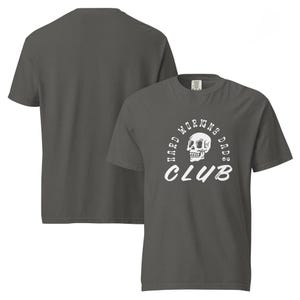 May include: A dark gray t-shirt with a white skull and the text "Hard Working Dads Club".