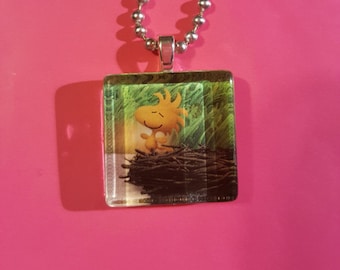 Woodstock Peanuts bird glass tile necklace