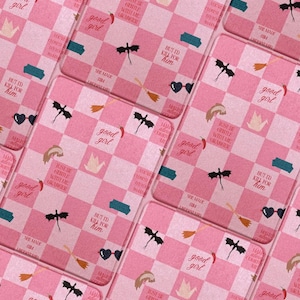 May include: A pink and white chequered pattern featuring illustrations and text. The design includes a dragon, a crown, a broom, and the phrases "good girl" and "but I'd kill for him."