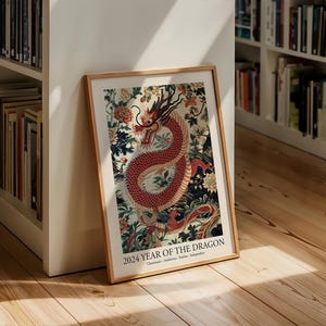 May include: A framed print of a red and gold dragon with floral details. The print is titled "2024 Year of the Dragon".
