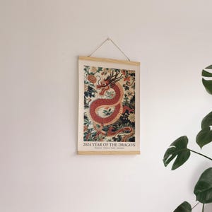 May include: A poster with a red dragon surrounded by flowers and the text "2024 Year of the Dragon".