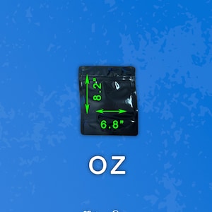May include: A black, rectangular bag with dimensions of 8.2 inches by 6.8 inches, with the letters "OZ" in white below it. The bag is on a blue background. The brand name "Ethan Alan Designs" is at the bottom.