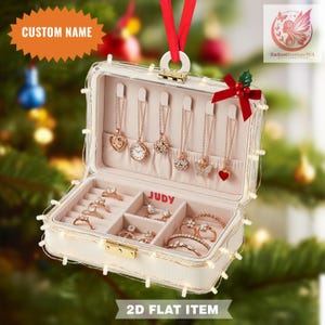 May include: A white jewelry box with a red ribbon, lit with fairy lights, and filled with necklaces, rings, and bracelets. The box has the text "CUSTOM NAME" and "JUDY" on it. The box is labeled "2D FLAT ITEM".