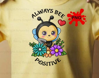 May include: Yellow t-shirt featuring a cartoon bee holding a trowel, surrounded by flowers. The text reads "ALWAYS BEE POSITIVE" in black, with a red heart and a red "PNG" graphic. The bee has large eyes and blue wings.