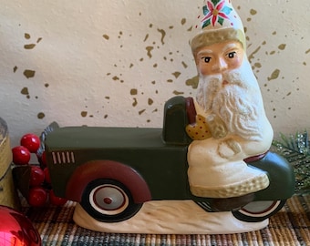Folk Art Chalkware Belsnickle Santa from Chocolate Mold on Car     READY TO SHIP
