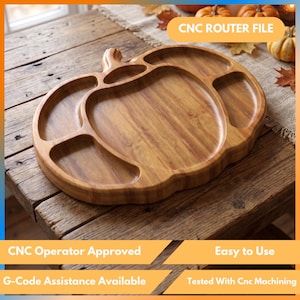 May include: A wooden serving tray shaped like a pumpkin with multiple carved compartments for food. The tray features a natural wood grain finish and a smooth surface. The text CNC ROUTER FILE is visible at the top of the image.