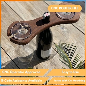 May include: A dark wood wine caddy with two circular cutouts for wine glasses and a central space for a wine bottle. The caddy is holding two wine glasses and a wine bottle. The text "CNC ROUTER FILE" is visible.
