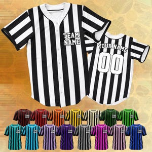 May include: Baseball jerseys with vertical stripes in various colors, including black and white, red, and blue. The jerseys feature the text "TEAM NAME" and "YOUR NAME" with the number "00".