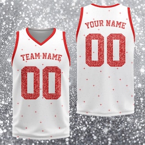 May include: A set of three ceramic mugs with a speckled, matte finish. The mugs are in shades of cream, light gray, and dark gray. Each mug has a simple, minimalist design and a rounded handle. The mugs are stacked on top of each other.