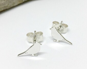 Bird silhouette sterling silver stud earrings.
