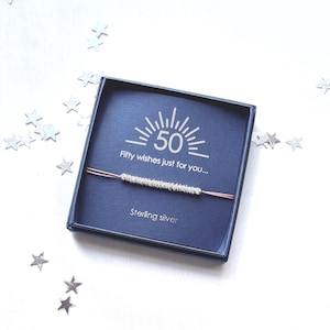 Special 50th Birthday charm bracelet with special message featuring sterling silver links on adjustable cord bracelet. Handmade