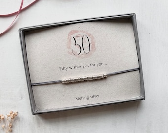 Special 50th Birthday charm bracelet with special message featuring sterling silver links on adjustable cord bracelet. Handmade