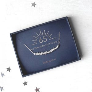 Special 65th Birthday necklace featuring 65 sterling silver links on delicate trace chain