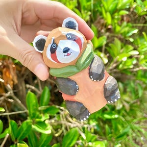 Hand Carved Wooden Raccoon Figurine: Woodland Desk Decor