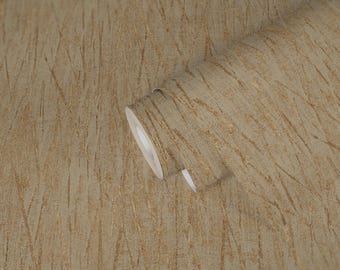 May include: A roll of textured wallpaper in shades of beige and gold. The wallpaper has a vertical, distressed pattern with gold streaks, creating a rustic and elegant look. The roll is partially unrolled, revealing the paper's texture.