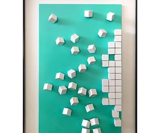 May include: Abstract wall art featuring a teal background with white geometric cubes and squares. The cubes are scattered across the surface, creating a 3D effect. The artwork is framed in a black frame.