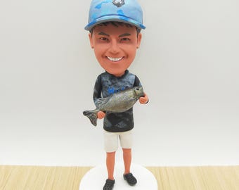 Spersonalizowana figurka wędkarza: ręcznie malowany prezent wędkarski z żywicy