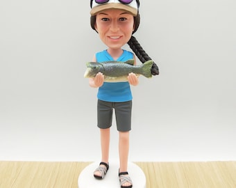 Figurka rybaka z kiwającą głową: ręcznie malowana figurka z żywicy