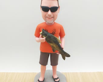 Figurka rybaka z kiwającą głową, ręcznie robiona żywiczna figurka rybaka