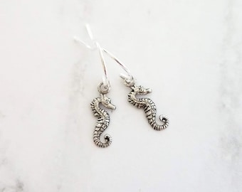 Tiny Seahorse Earrings - little antique silver silver charms dangle on small simple shiny delicate hooks, tropical beach vacation memento