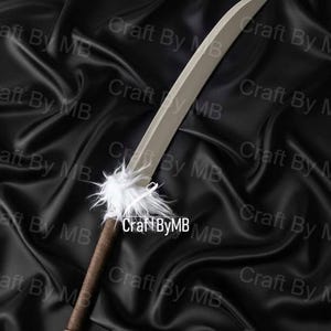 May include: A decorative sword with a curved, silver blade and a brown handle. The handle is wrapped in brown material and has a silver pommel. White fluffy material is attached near the blade. The text "Craft By MB" is visible.
