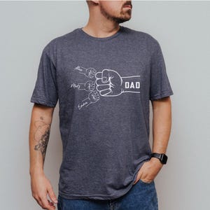 Custom Fist Bump Dad Shirt, Father&#39;s Day Gift, New Dad Gift, Dad Shirt With Kids Names, Papa Hand with Kid Name, Personalized Grandpa Shirt