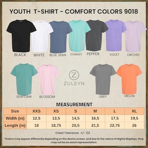 May include: A color chart for Comfort Colors 9018 youth t-shirts featuring eleven solid colors including black, white, blue jean, chalky, pepper, violet, orchid, seafoam, blossom, grey, and melon, with a size measurement table in inches.