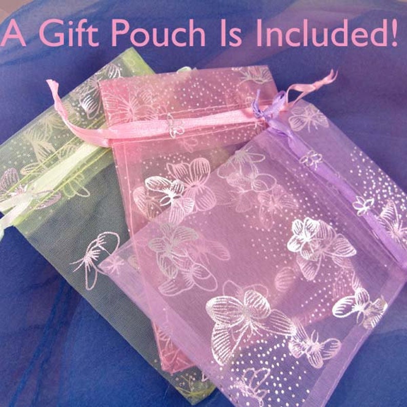 May include: Three sheer gift bags with floral and butterfly designs. The bags are pink, light green, and lavender. A gift pouch is included!.