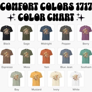 May include: Color chart of Comfort Colors 1717 t-shirts. The chart displays various shirt colors, including black, sage, midnight, pepper, berry, espresso, moss, yam, blue jean, seafoam, bay, mustard, ivory, and white. Each shirt features a floral design.