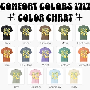 May include: A color chart displays t-shirts in various colors, each featuring a lemon and leaf design. The text "COMFORT COLORS 1717 COLOR CHART" is at the top. Colors include black, pepper, espresso, moss, light green, yam, blue jean, violet, seafoam, terracotta, bay, blossom, chambray, and ivory.