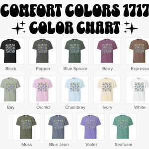 May include: A color chart displays various t-shirt colors, including black, pepper, blue spruce, berry, espresso, bay, orchid, chambray, ivory, white, moss, blue jean, violet, and seafoam. The shirts feature a floral design and the text "COMFORT COLORS 1717 COLOR CHART".