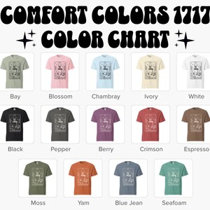 May include: A color chart displays Comfort Colors 1717 t-shirts in various hues. The shirts are arranged in rows and columns, showcasing colors like Bay, Blossom, Chambray, Ivory, White, Black, Pepper, Berry, Crimson, Espresso, Moss, Yam, Blue Jean, and Seafoam.