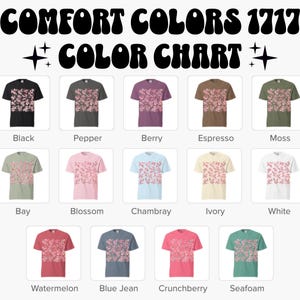 May include: A color chart displays various t-shirt colors, each showcasing a floral pattern. The available colors include black, pepper, berry, espresso, moss, bay, blossom, chambray, ivory, white, watermelon, blue jean, crunchberry, and seafoam.